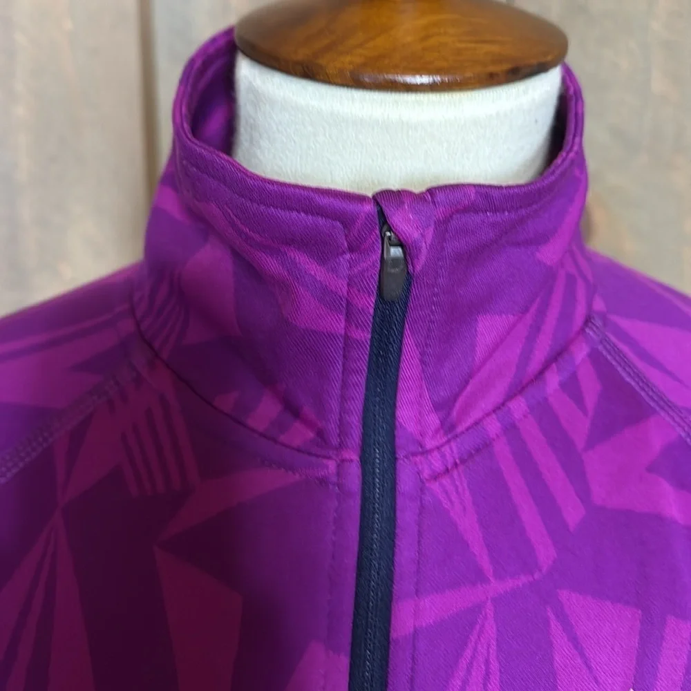 Nike Dri-Fit running top with reflective details Size Medium Magenta / pink